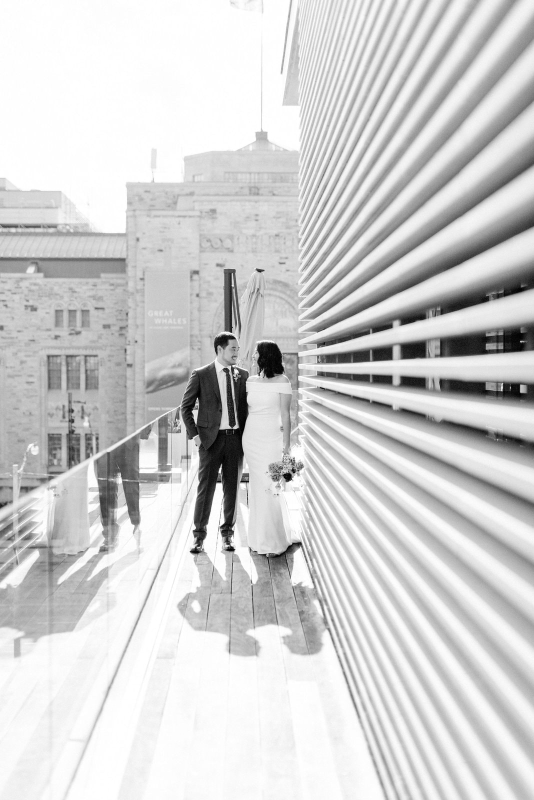 Bride and Groom Embrace Editorial Portrait at Gardiner Museum Balcony Downtown Toronto Wedding Photographer Jacqueline James Photography