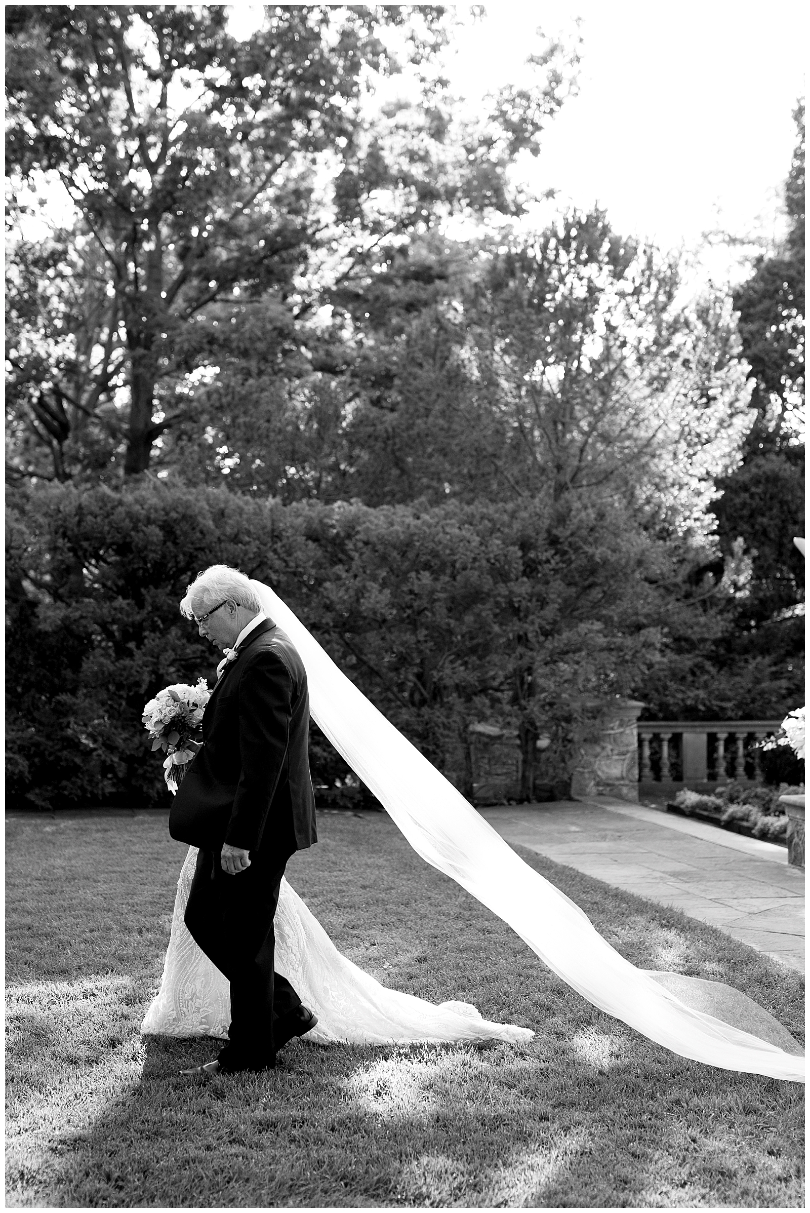 Bride walking with father dramatic entrance at Graydon Hall Manor Toronto Romantic Wedding