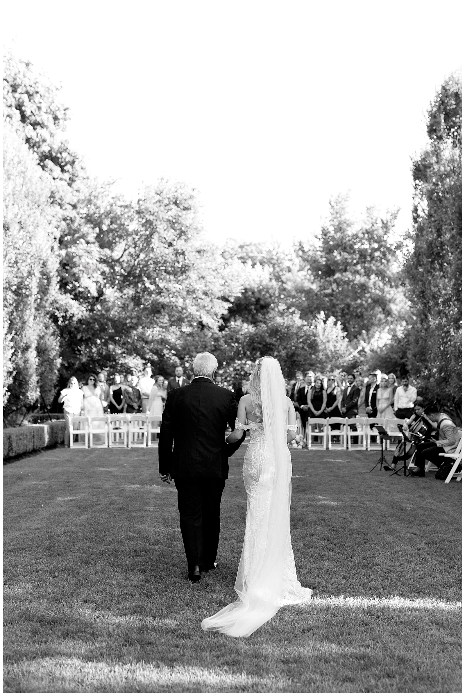 Bride walking with father dramatic entrance at Graydon Hall Manor Toronto Romantic Wedding