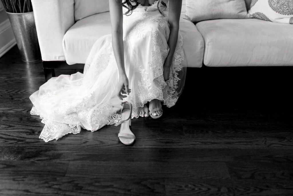 bride putting on shoes berkeley events toronto wedding jacqueline james photography