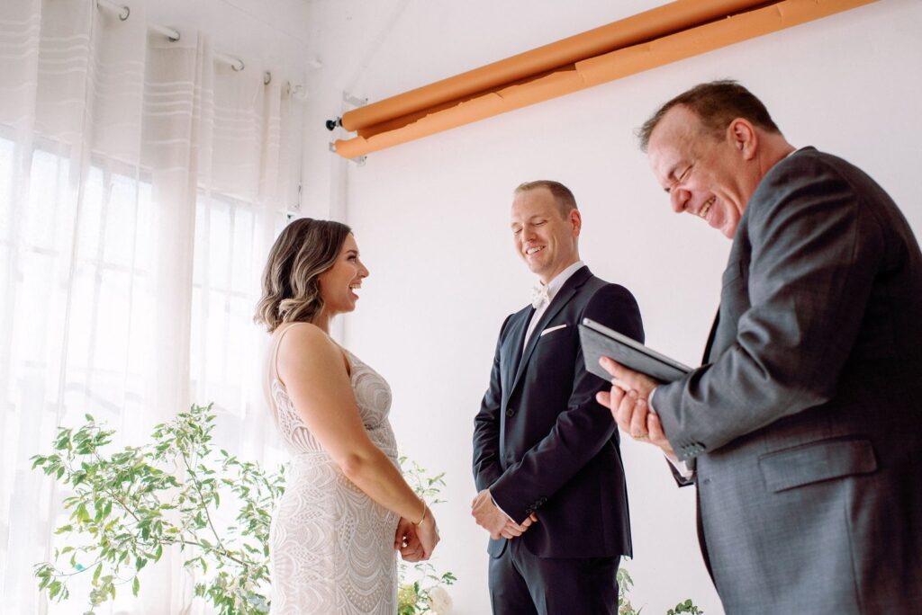 Candid Moment of Couple at Intimate Wedding Ceremony at Lovt Studio Toronto. Intimate Wedding Venue Jacqueline James Photography