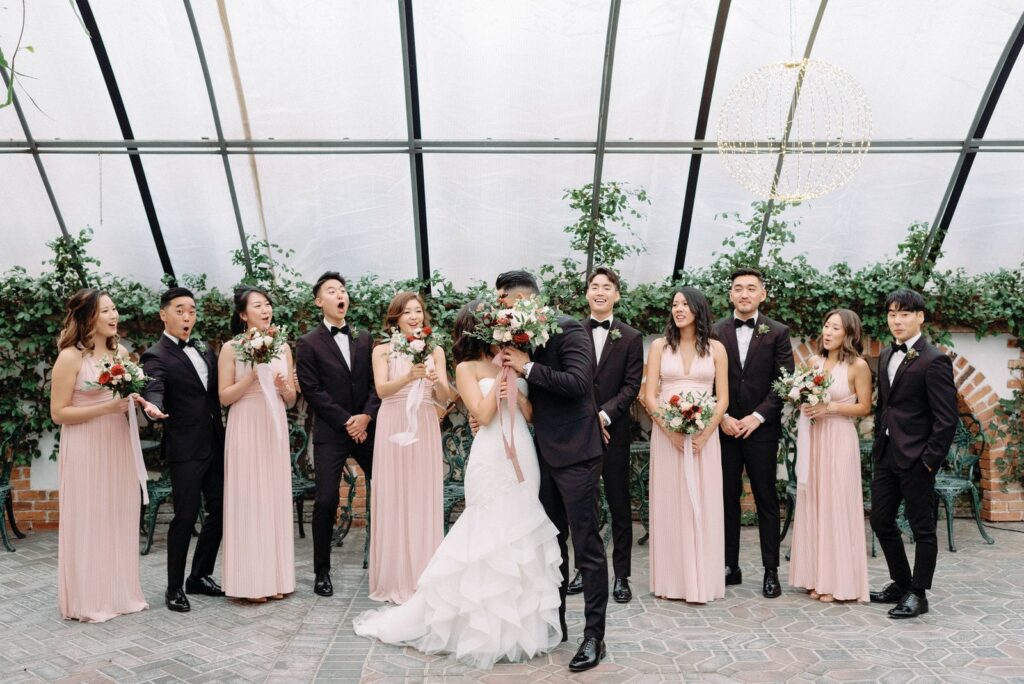 Kiss Silly Fun with wedding party Madison Greenhouse Wedding Newmarket Toronto Wedding Venue Jacqueline James Photography