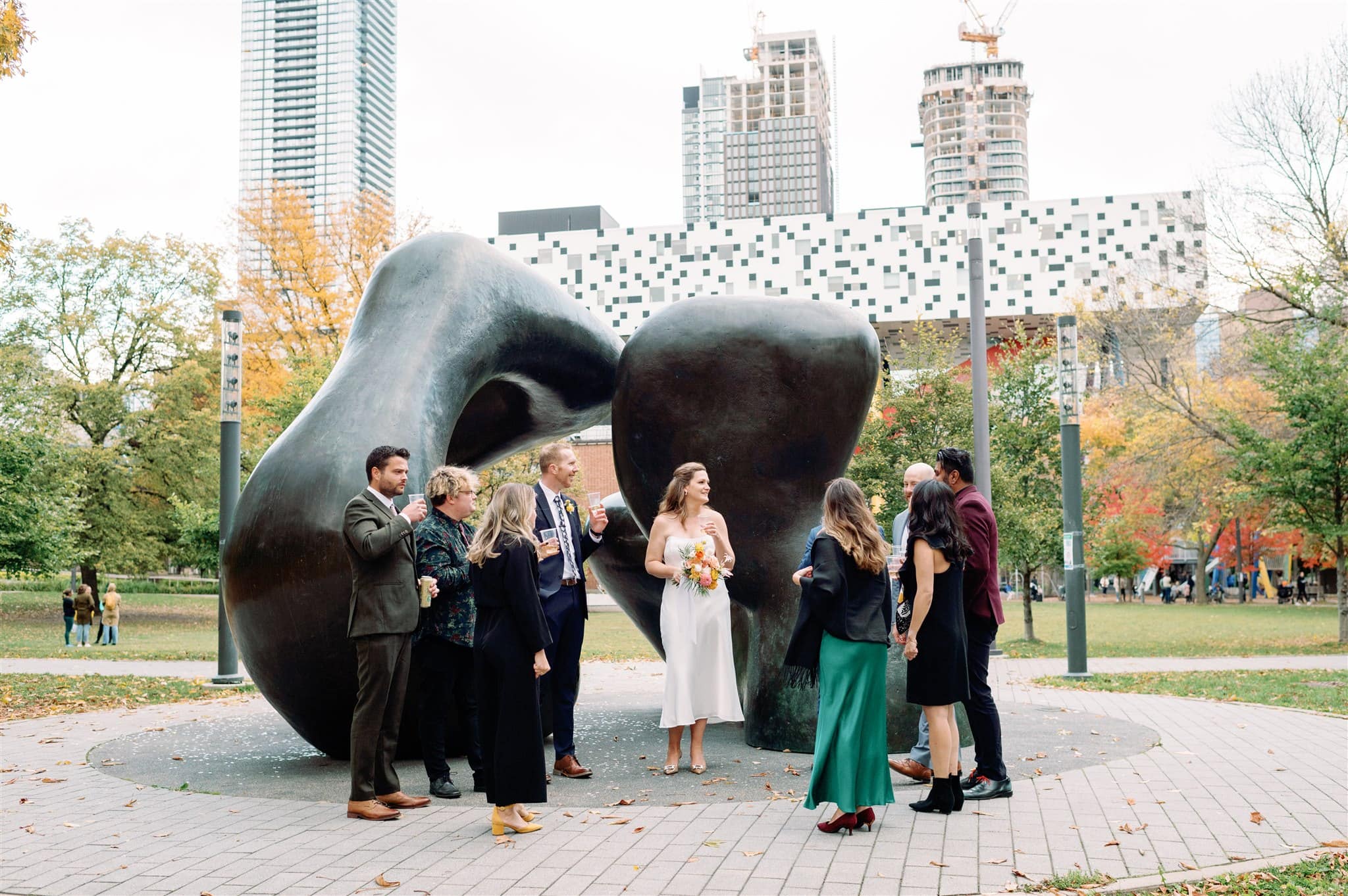 Popping Champagne Candid Moment Fall Intimate Wedding Toronto Peter Pan Bistro Jacqueline James Photography