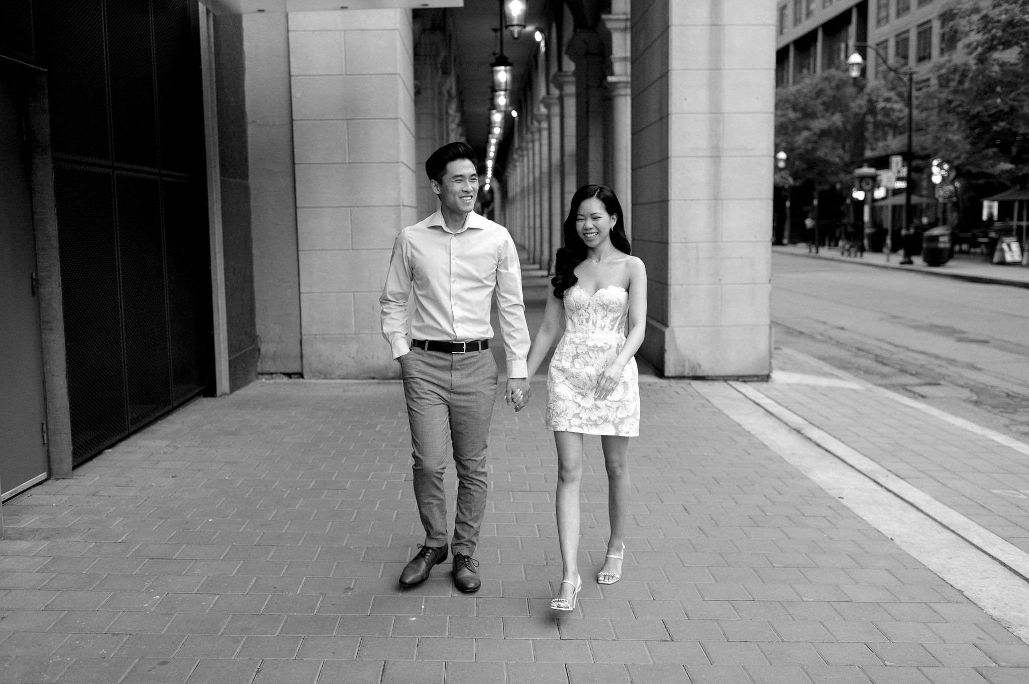 Modern editorial toronto couple romantic engagement photo session esplanade candid walking