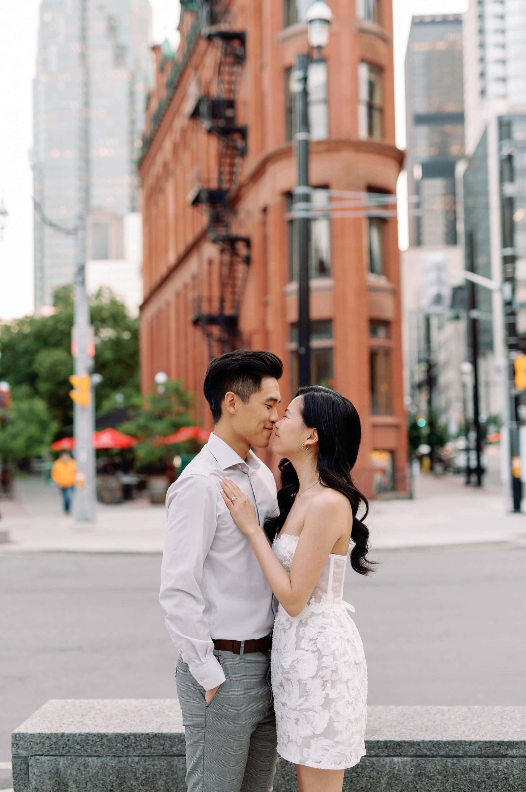 Modern editorial toronto couple romantic engagement photo session esplanade st lawrence market gooderham building