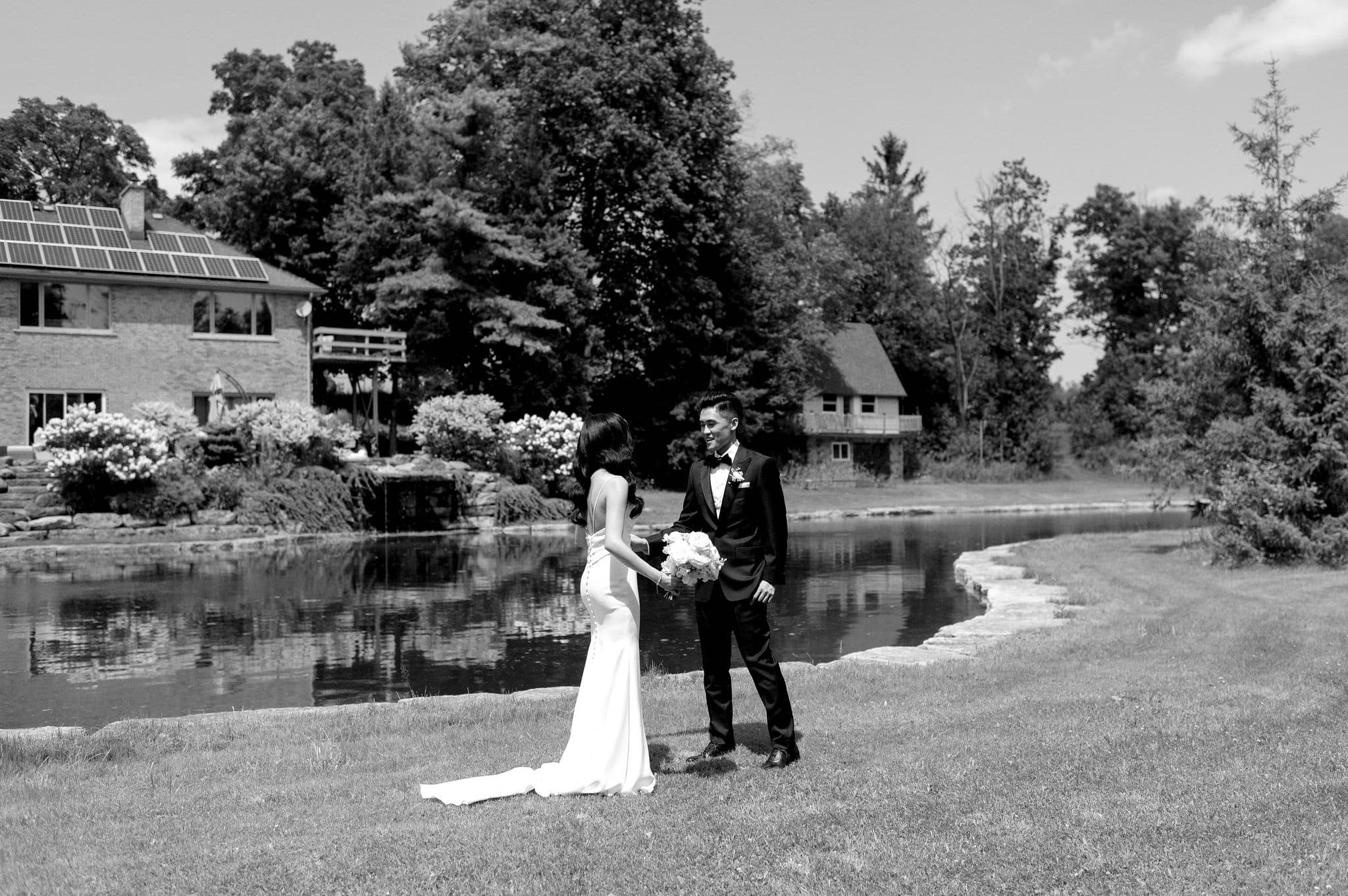 bride and groom first look candid moment whistle bear golf club wedding cambridge