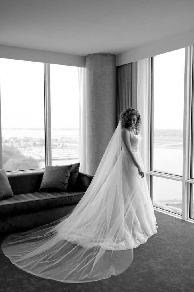 editorial candid moment of bride in wedding dress bridal portrait classic hotel x toronto