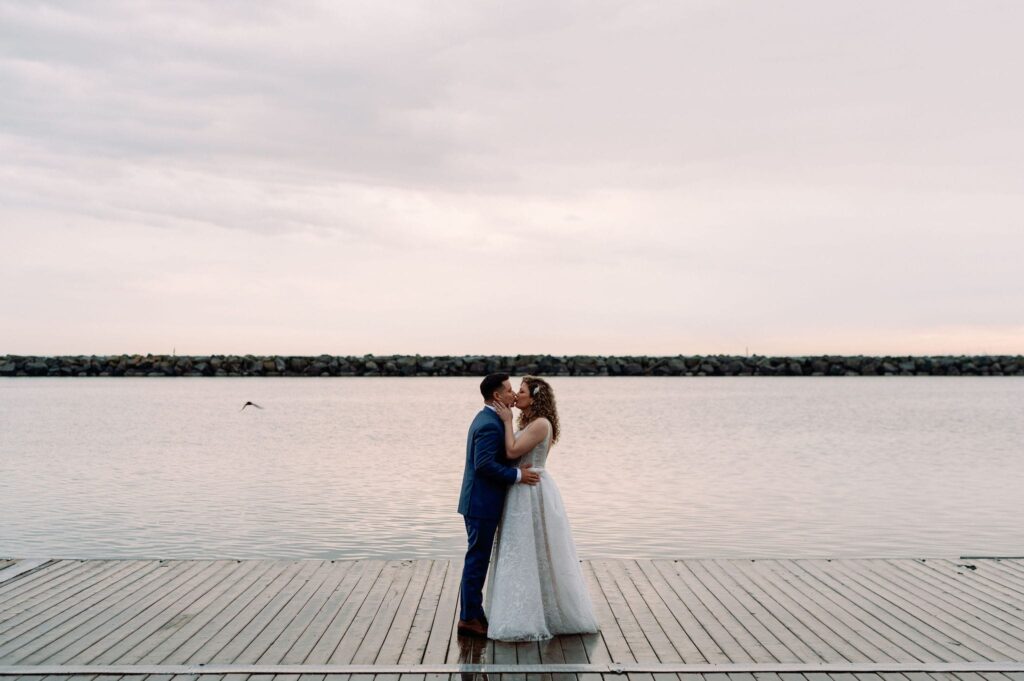 the henley room wedding toronto argonaut rowing club sunset hour golden hour waterfront lakeshore summer raining romantic 