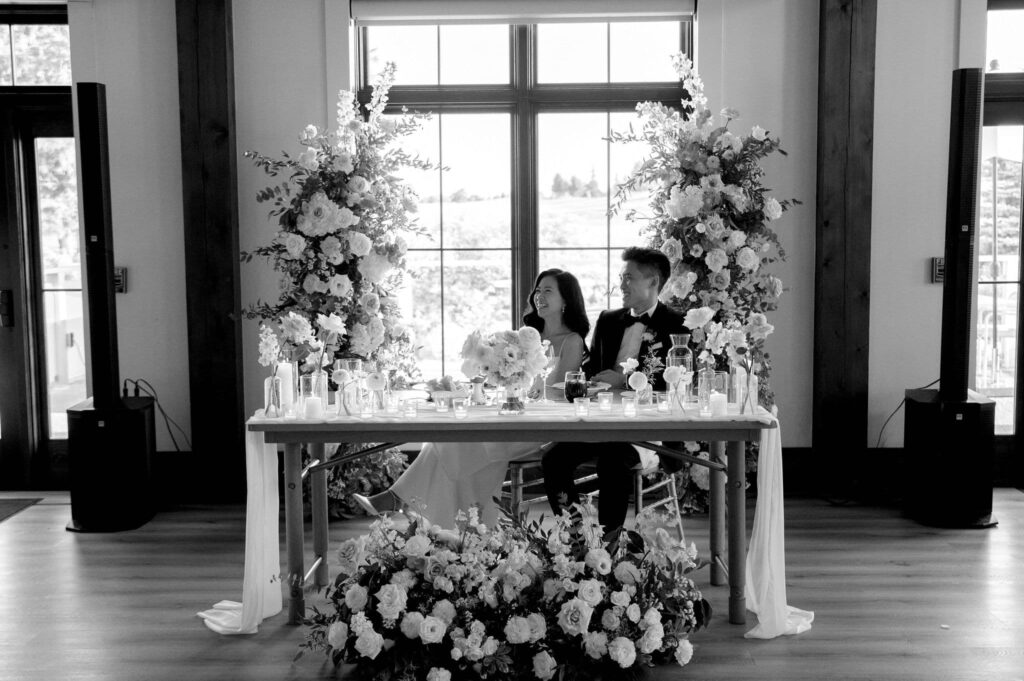 happy candid reception moment at whistle bear golf club wedding cambridge