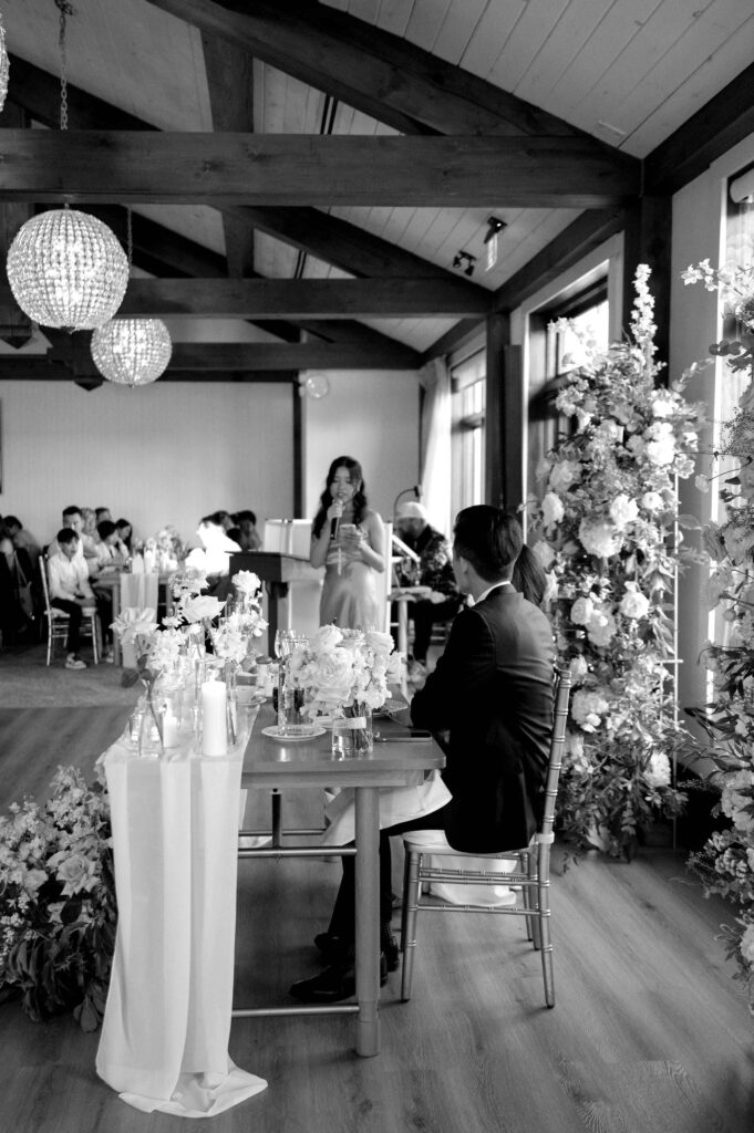 happy candid reception moment at whistle bear golf club wedding cambridge