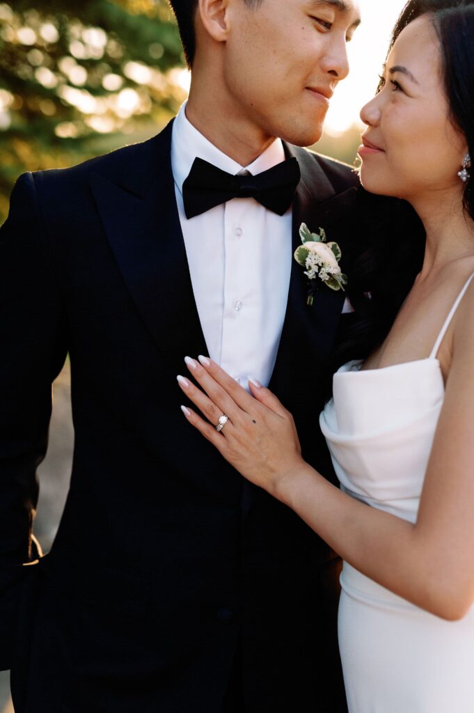 modern editorial timeless wedding portrait at sunset golden hour bride and groom walking at whistle bear golf club wedding cambridge