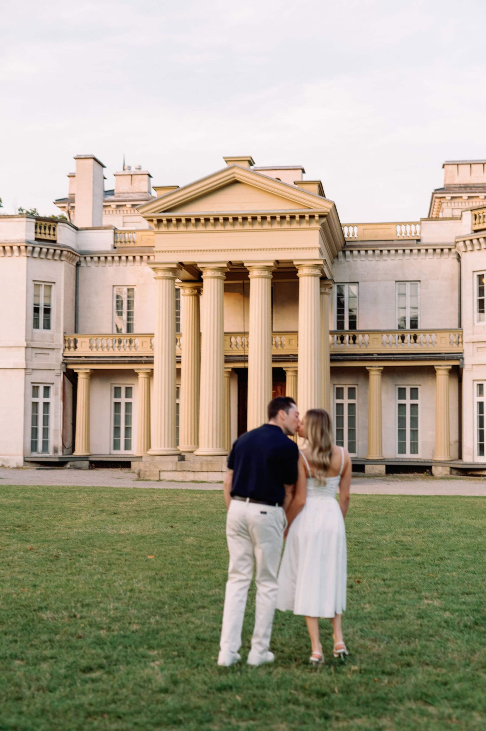 Candid moment with columns and warm evening light at Dundurn Castle