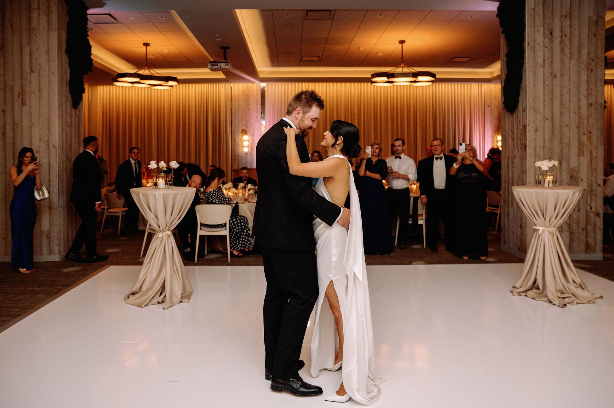 Bride and groom sharing their first dance at 1 Hotel Toronto during their modern downtown wedding