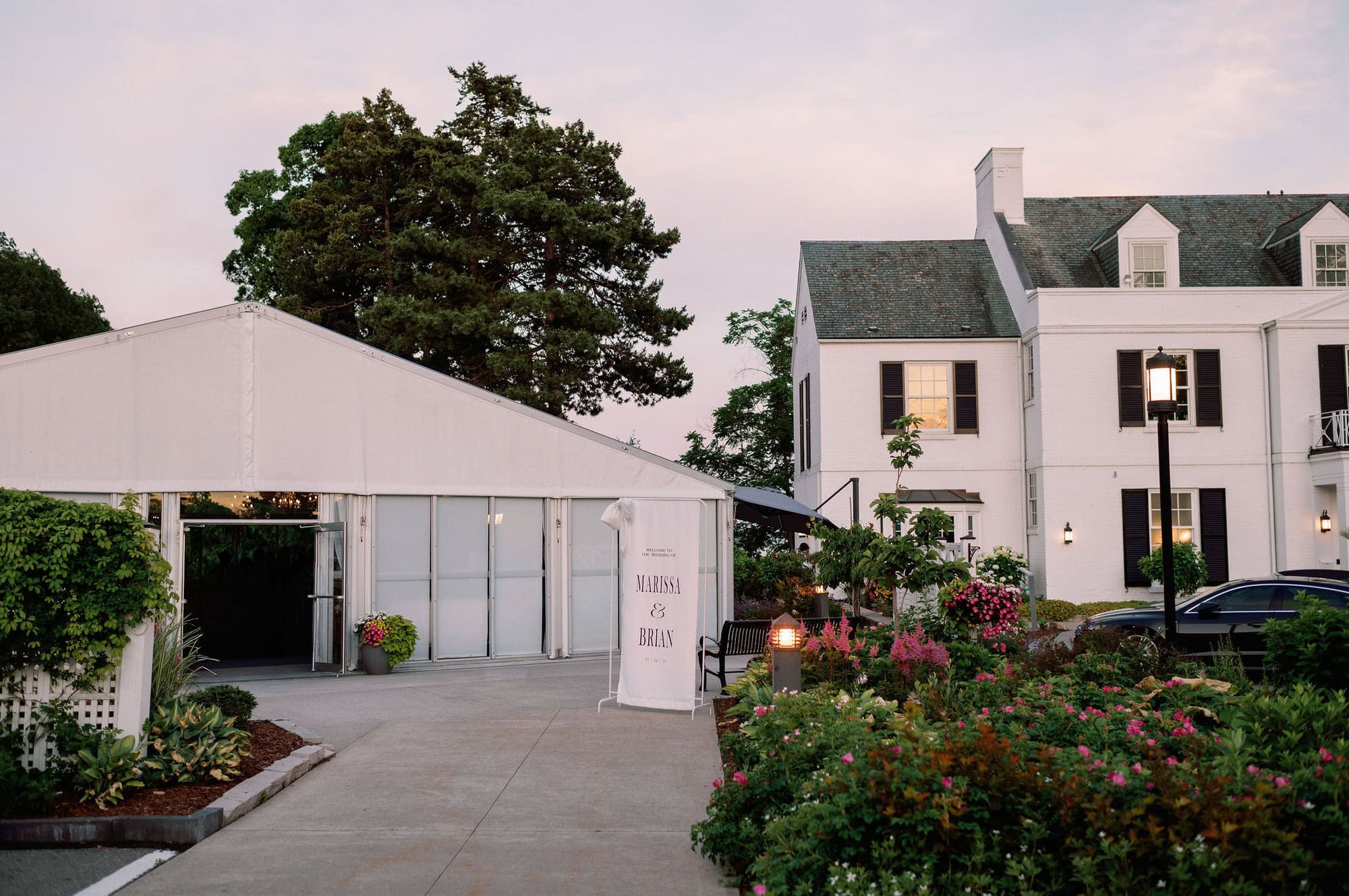 Evening view of Harding Waterfront Estate with the tented reception space in the background.
